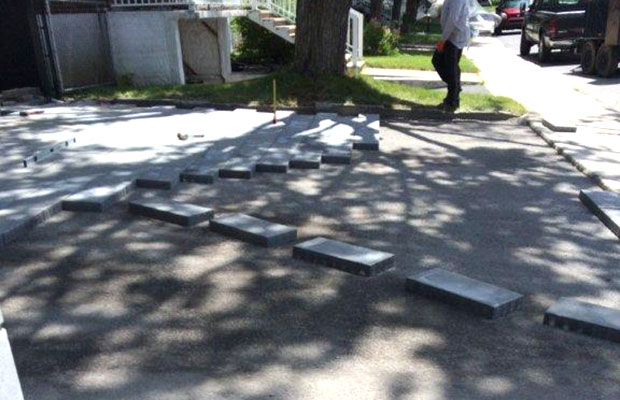 Installation et réparation de pavé uni